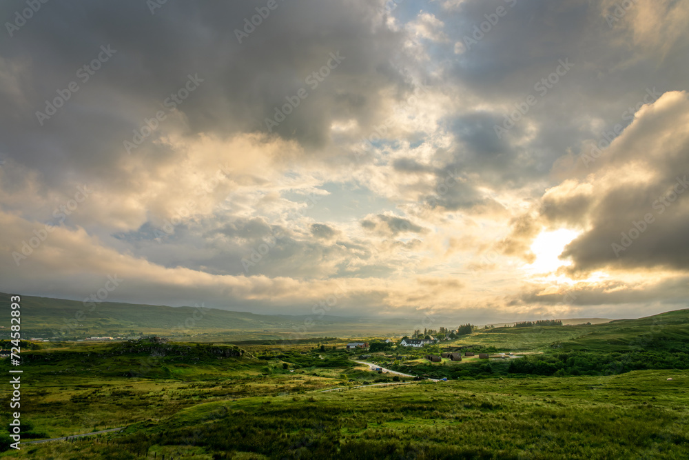 Isle of Skye landscape with dramatic sky at sunset, Scotland, UK Isle of Skye landscape with dramatic sky at sunset, Scotland, UK