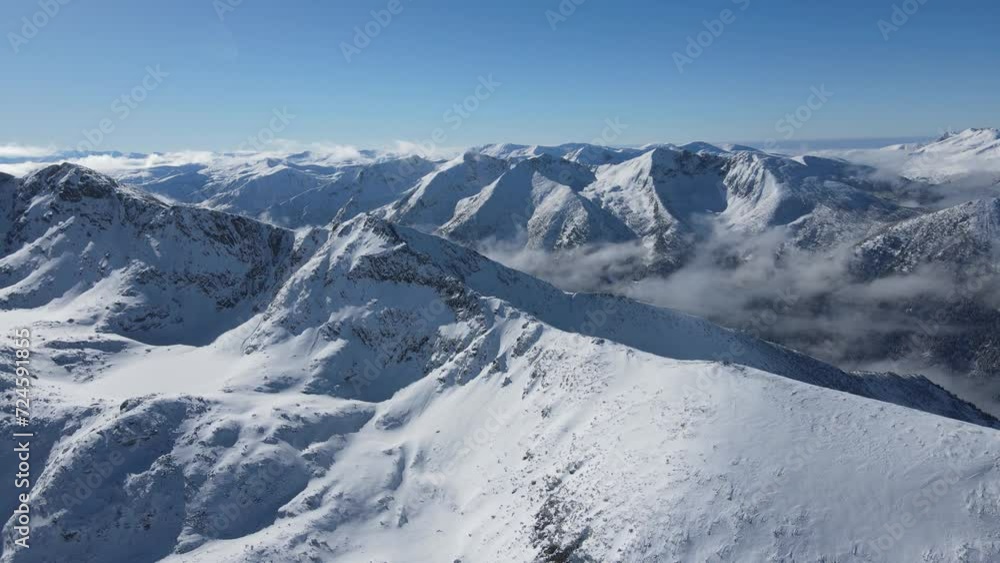 Amazing Aerial Winter view of Rila mountain near Musala peak, Bulgaria Amazing Aerial Winter view of Rila mountain near Musala peak, Bulgaria
