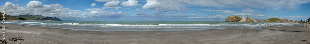 Lighthouse on rocks. Castle point coast New Zealand. Pacific ocean. Panorama and beach. Lighthouse on rocks. Castle point coast New Zealand. Pacific ocean. Panorama and beach.