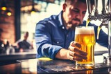 Man Serving Draft Beer at Bar