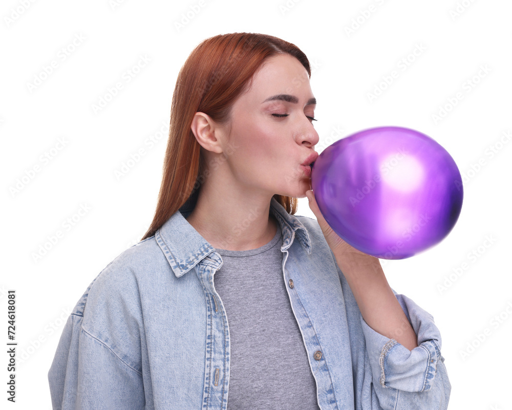 Woman inflating purple balloon on white background Woman inflating purple balloon on white background