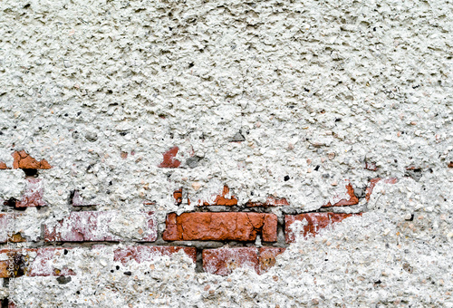 texture of old brick wall with plaster