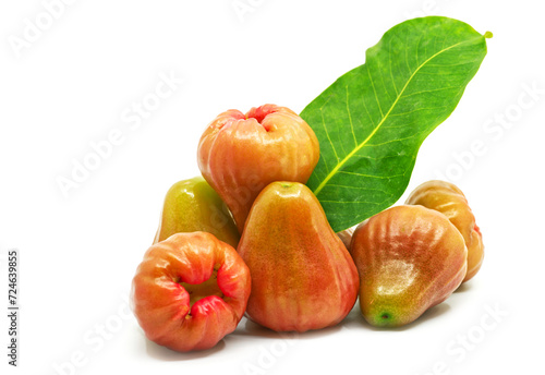 Thailand fruit, A Group of Rose Apple on a white background with its leaf as decoration, close up a pile of Rose Apple or Chomphu in Thailand language. photo