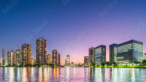                                                                                                                                               Twilight time on the Sumida River. See the tower condominiums of Tsukuda  Island and the Chuo Bridge