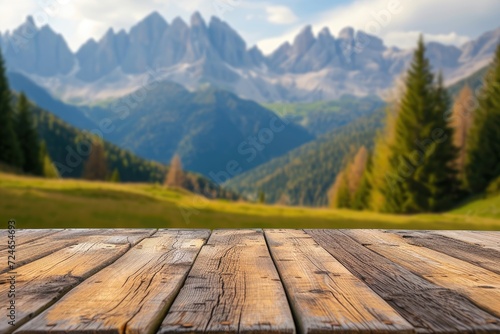 Wooden table top on blurred background of spring color landscape in dolomites - for display your products