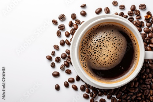 Coffee cup and beans on a white backdrop
