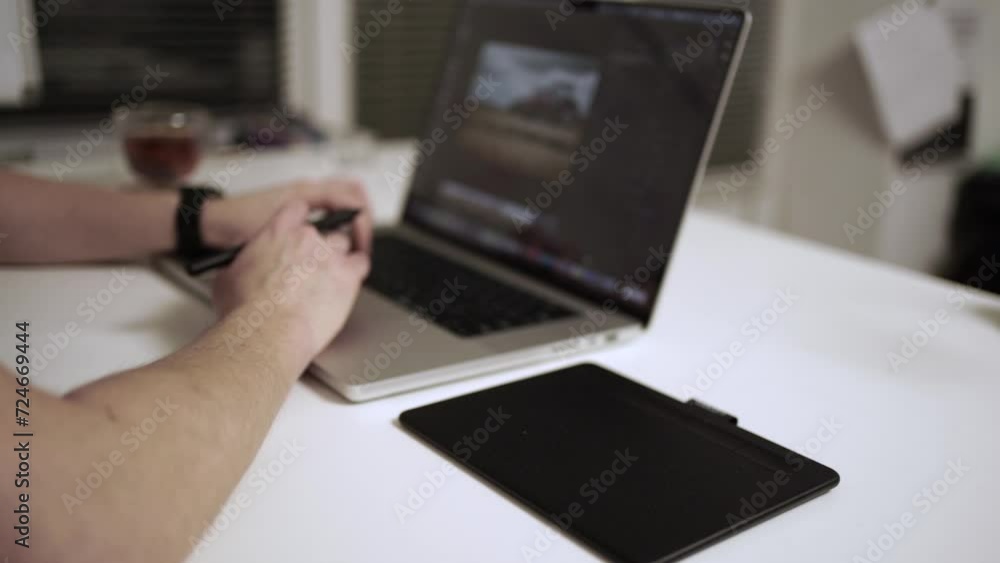 Photographer working on laptop on the table. Editing photograph Photographer working on laptop on the table. Editing photograph