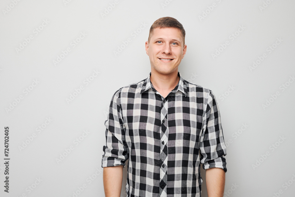 Portrait man smiling joyfully with happy face isolated on white studio background, advertising banner. Portrait man smiling joyfully with happy face isolated on white studio background, advertising banner.