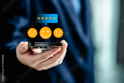 User customer review evaluates satisfaction with a product or service, Customers give a rating to service experience on the online application, Customer review satisfaction feedback survey concept.