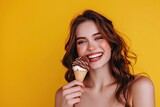 young woman enjoying a delicious chocolate wafer