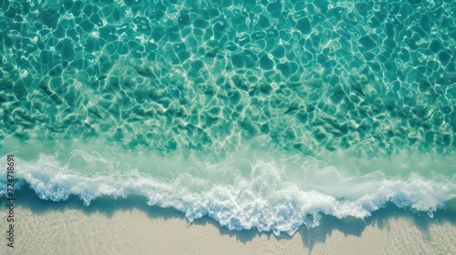 Sunlight ripples on sandy ocean floor