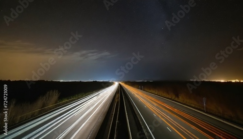 a long exposure photo of a highway at night 