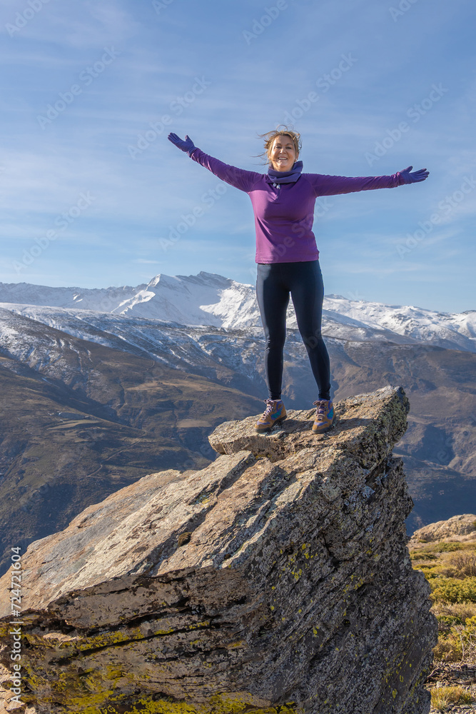 Woman with Open Arms on a High Mountain Ridge, Sierra Nevada