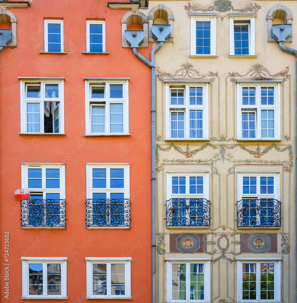 Beautiful architecture of the old town in Gdansk. Close-up with details. Bright facades of buildings. View of the Old Town. A walk through the city on a sunny summer day