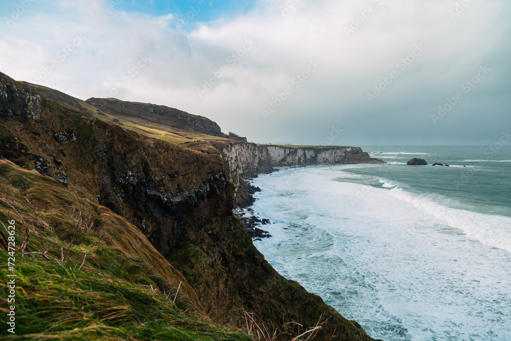 Beautiful cliff landscape on a cloudy day in Northern Ireland