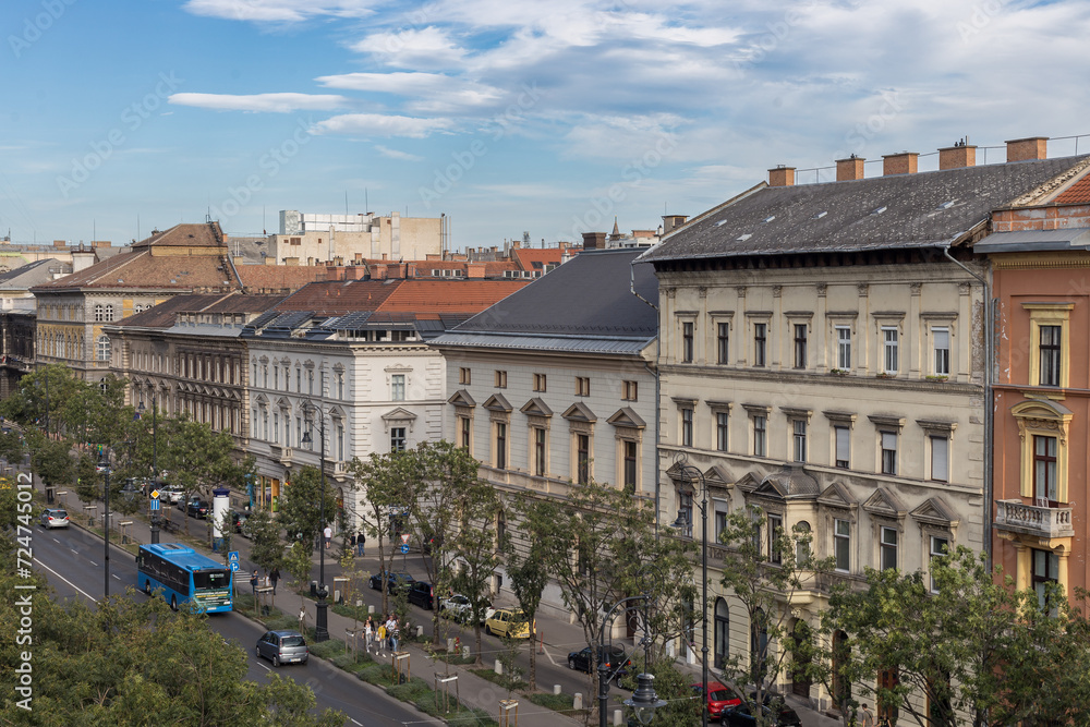 Looking down Andrassy boulevard with gorgeous vintage buildings in urban Budapest