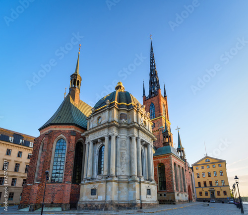 The Riddarholmen Church in Stockholm, Sweden. Cityscape of Stockholm, Sweden. Evening time and soft sunlight. A walk through the city