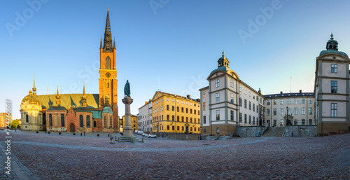The Riddarholmen Church in Stockholm, Sweden. Cityscape of Stockholm, Sweden. Evening time and soft sunlight. A walk through the city. Panoramic view.
