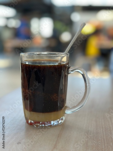 selective focus of hot coffee on the table