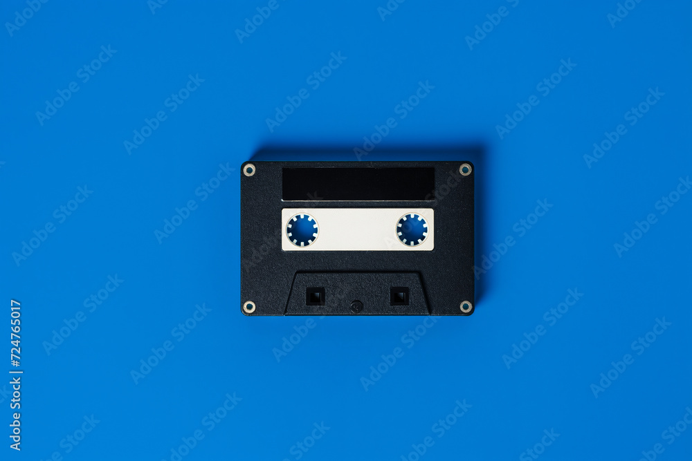 Fototapeta premium Isolated illustration of a retro cassette tape front panel on a blue background