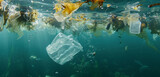 Plastic garbage floating underwater.Plastic Disaster,Micro Plastic Pollution,Water Pollution Concept.