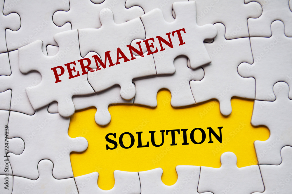 Permanent Solution text on missing jigsaw puzzle. Strategic problem solving concept. Permanent Solution text on missing jigsaw puzzle. Strategic problem solving concept.