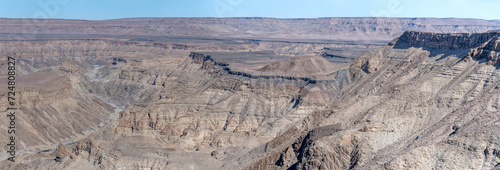 Photos escarpment worn slopes and meandering dry riverbed looking north from Canyon vie