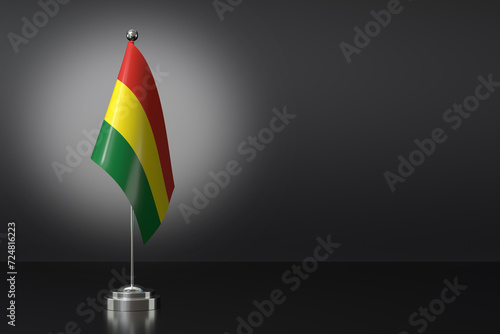 Small Plurinational State of Bolivia Flag in Front of Black Background, 3d Rendering photo