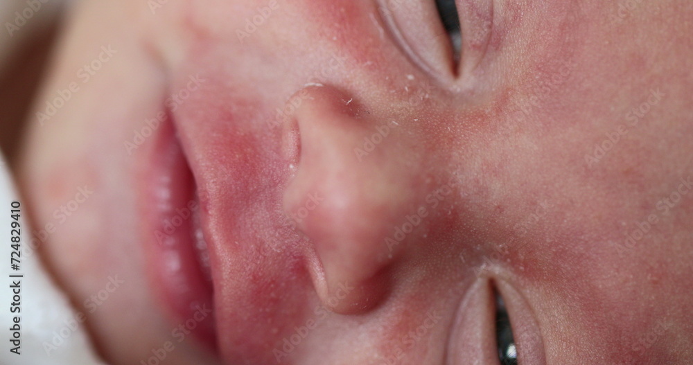 Fototapeta premium Newborn baby infant close-up macro detail
