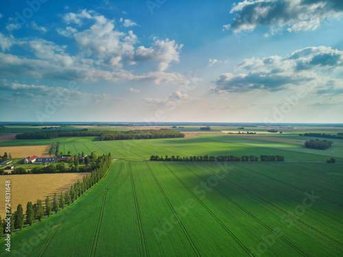 Aerial drone view of green fields and meadows in Yveliness,, near Paris, France photo