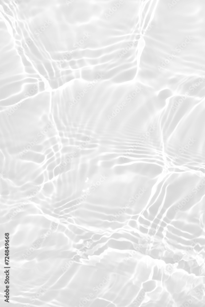 White water with ripples on the surface. Defocus blurred transparent white colored clear calm water surface texture with splashes and bubbles. Water waves with shining pattern texture background. White water with ripples on the surface. Defocus blurred transparent white colored clear calm water surface texture with splashes and bubbles. Water waves with shining pattern texture background.