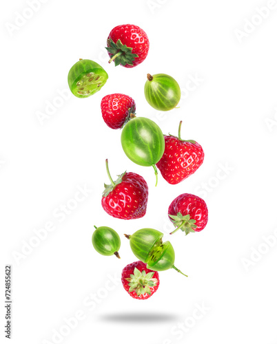 Fototapeta Naklejka Na Ścianę i Meble -  Group of ripe juicy strawberries and gooseberries close up in the air on a transparent background