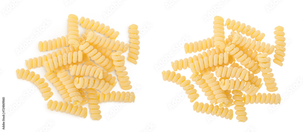Italian spiral shaped pasta, Fusilli bucati macaroni, isolated on white background. Top view. Flat lay.