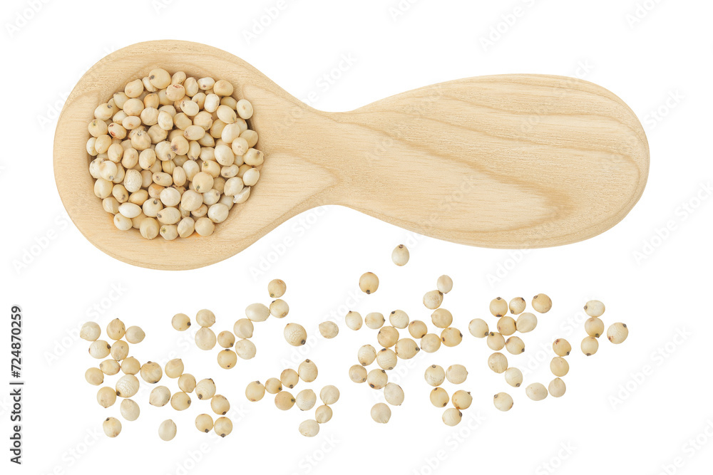 Sorghum seeds in wooden spoon isolated on white background. Top view. Flat lay. Sorghum seeds in wooden spoon isolated on white background. Top view. Flat lay.