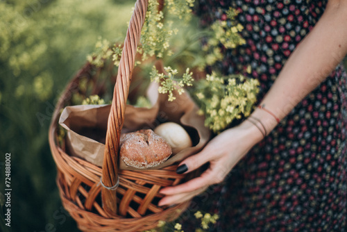 Wallpaper Mural Picnic basket with bread against the backdrop of a rapeseed field. Torontodigital.ca