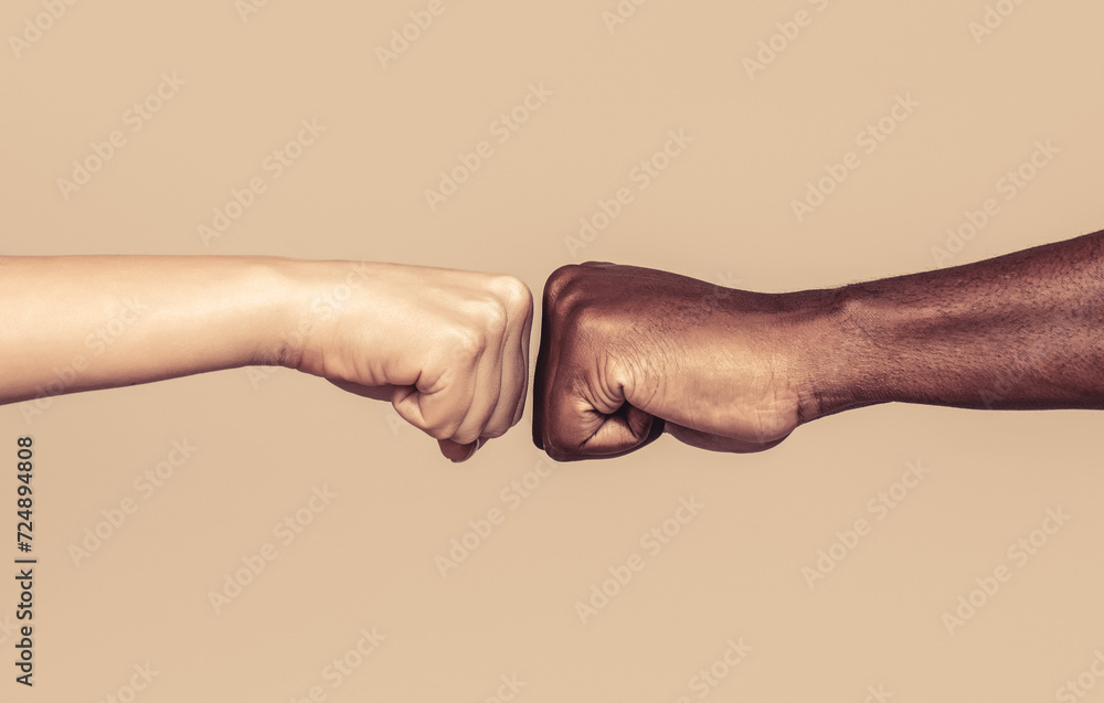 Friendship, team, good work. Closeup friends giving fist bump to each other. Black african american race male and woman hands giving a fist bump, multiracial diversity, immigration concept - obrazy, fototapety, plakaty 