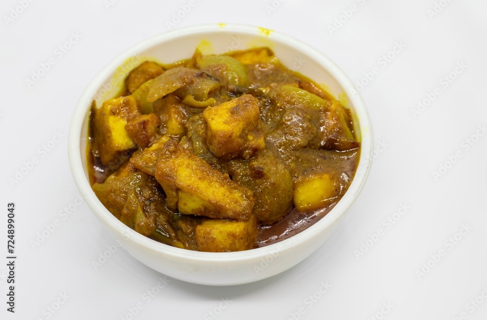 Masala Paneer or Cheese Curry Gravy in White Bowl Isolated on White Background Masala Paneer or Cheese Curry Gravy in White Bowl Isolated on White Background