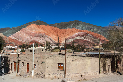 Old adobe village and rainbow colored mountains of Purmamarca, Jujuy, Argentina, South America