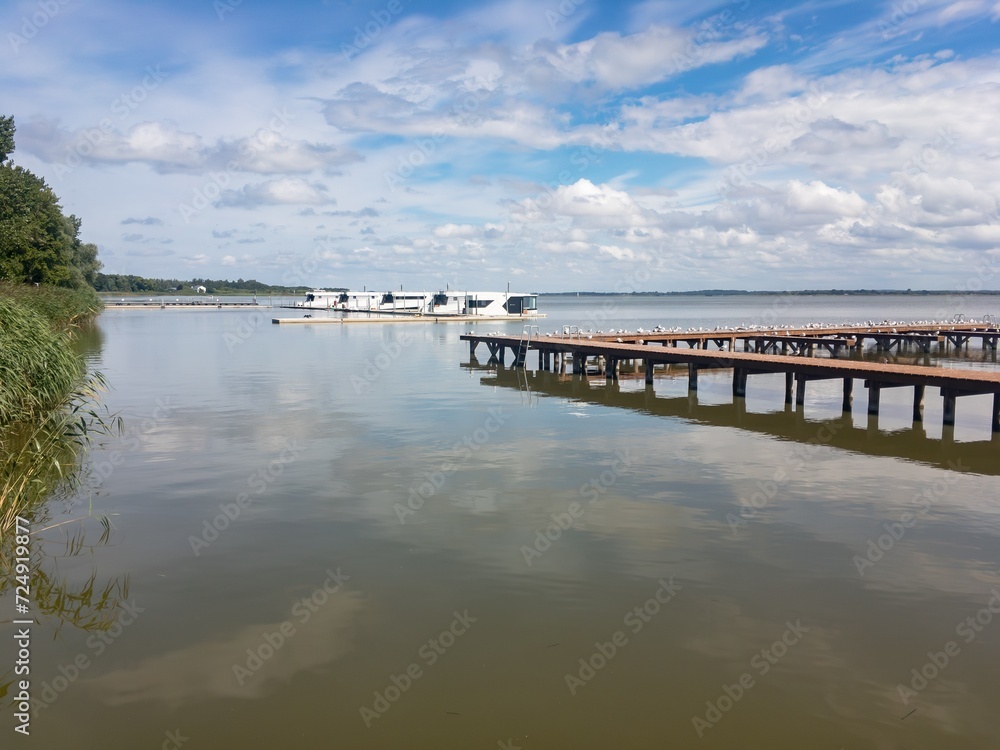 Landscape of Jamno lake with pier and modern houseboats