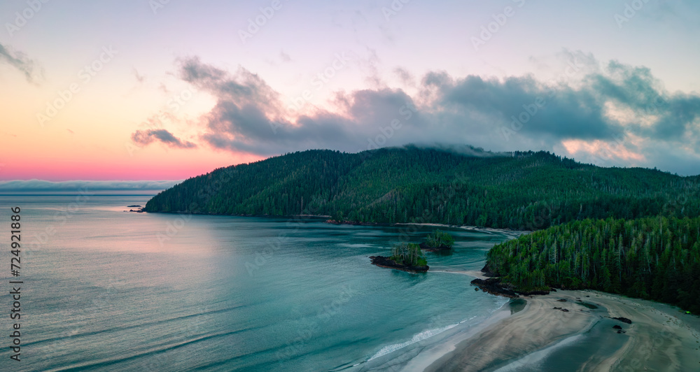 Sandy shore on Pacific Ocean West Coast. Sunrise. Vancouver Island, BC, Canada.