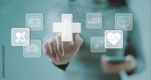 Health care concept. Business hand holding virtual medical health care icons with medical network connection. People health care awareness rising growth of medical health and life insurance business.