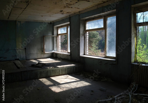 The interior of some abandoned buildings destroyed by time, in the exclusion zone of the city of Pripyat (Ukraine) famous for the Chernobyl disaster photo