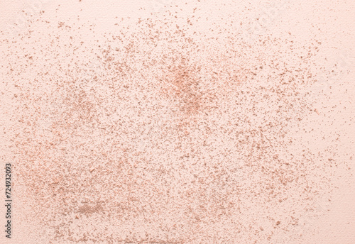 Grunge Apricot Color Background With Crushed Chalk. Crushed School Chalk Lying on Peach Color Layout. Spilled Powder. Surfaces Made of Chalk Dust. Flat Lay. No text.