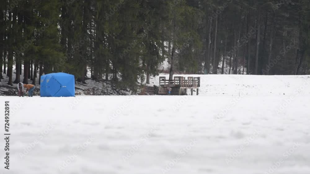 Bradford Pennsylvania USA January 23 2024: Marilla reservoir People fishing on ice Bradford Pennsylvania USA January 23 2024: Marilla reservoir People fishing on ice