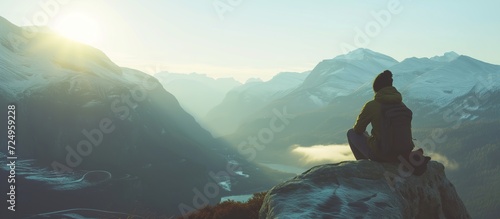 A man on top of a hill in silence and loneliness.