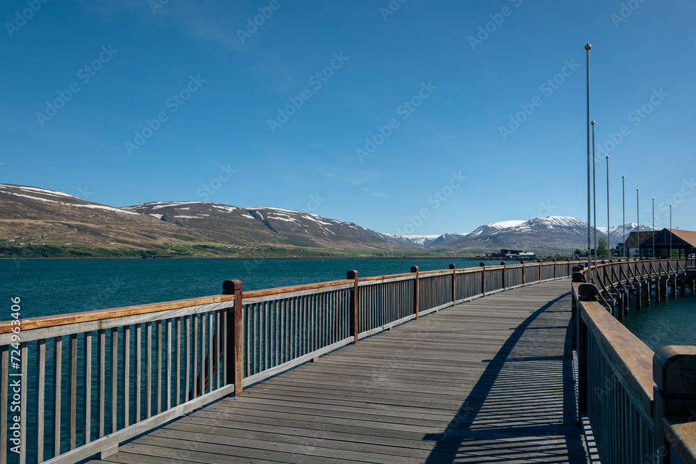 Wooden walkway on the shore of Lake Tekapo, New Zealand