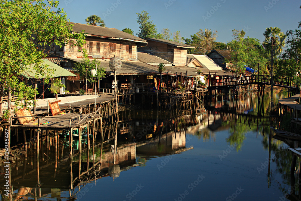 Wooden houses near the water Rural life at Ban Khlong Dan, Songkhla Province, Thailand 