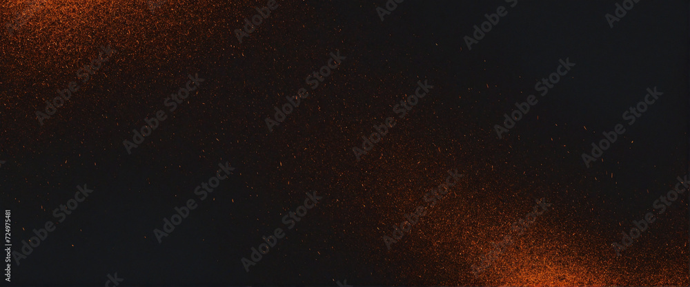 Deep hues of orange and black swirl in an abstract background of light and texture