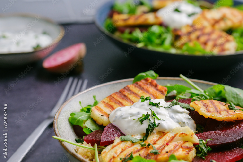 Vegetarian Grilled Halloumi Quinoa Salad with Beetroot. Healthy Mediterranean Food Concept. Close-up.