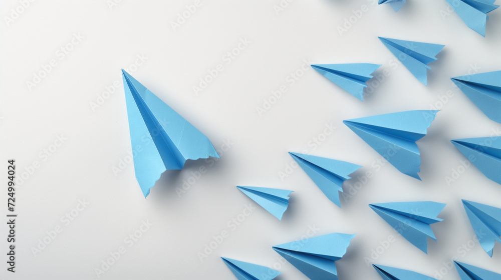 Group of Blue Paper Airplanes on White Wall Group of Blue Paper Airplanes on White Wall